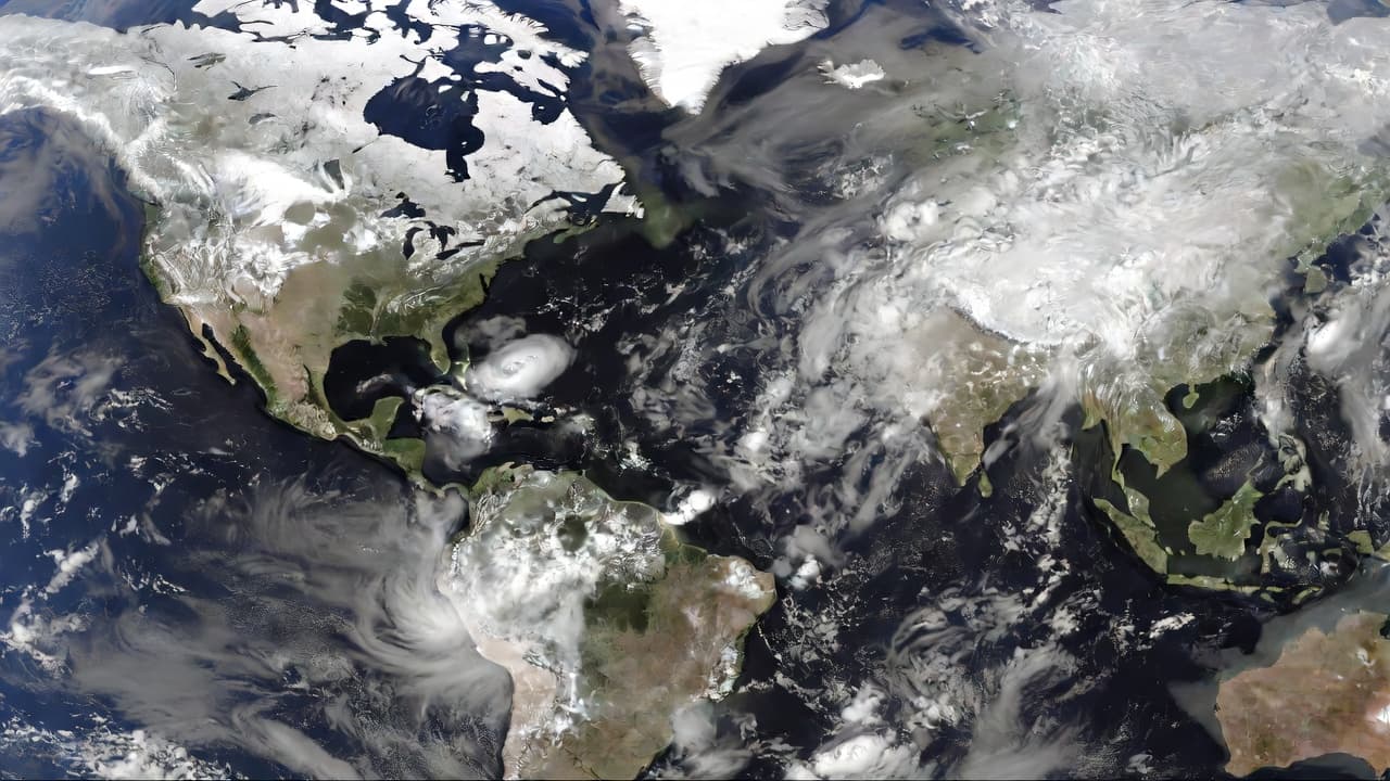 Major weather systems visible in cloud patterns